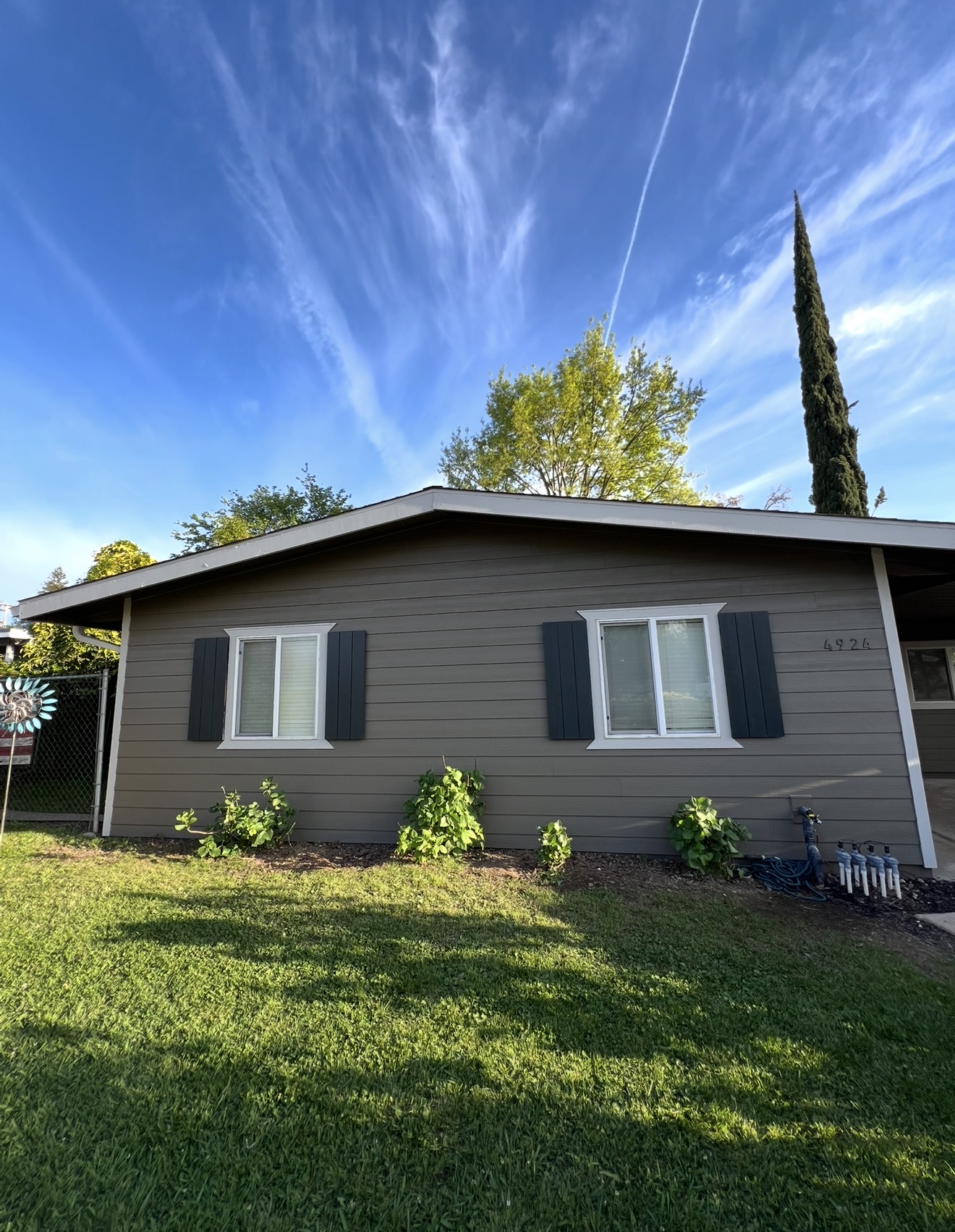 Exterior remodeling project with new siding and trim